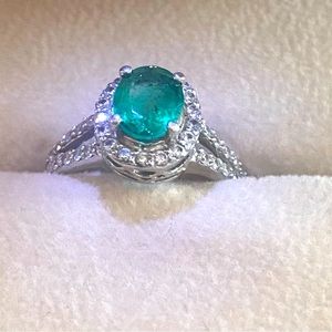 One Platinum Emerald $ Diamond Ring